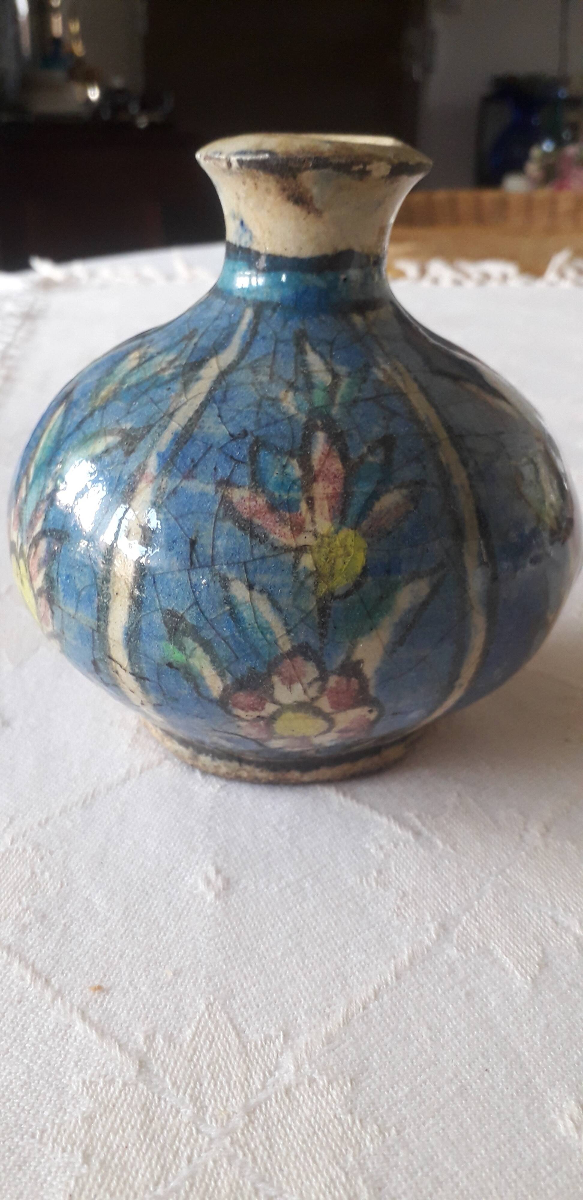 Very original old vase with floral decoration