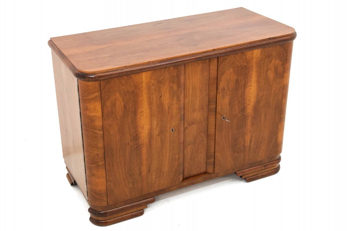 Art Deco style walnut chest of drawers, Poland, 1950s.