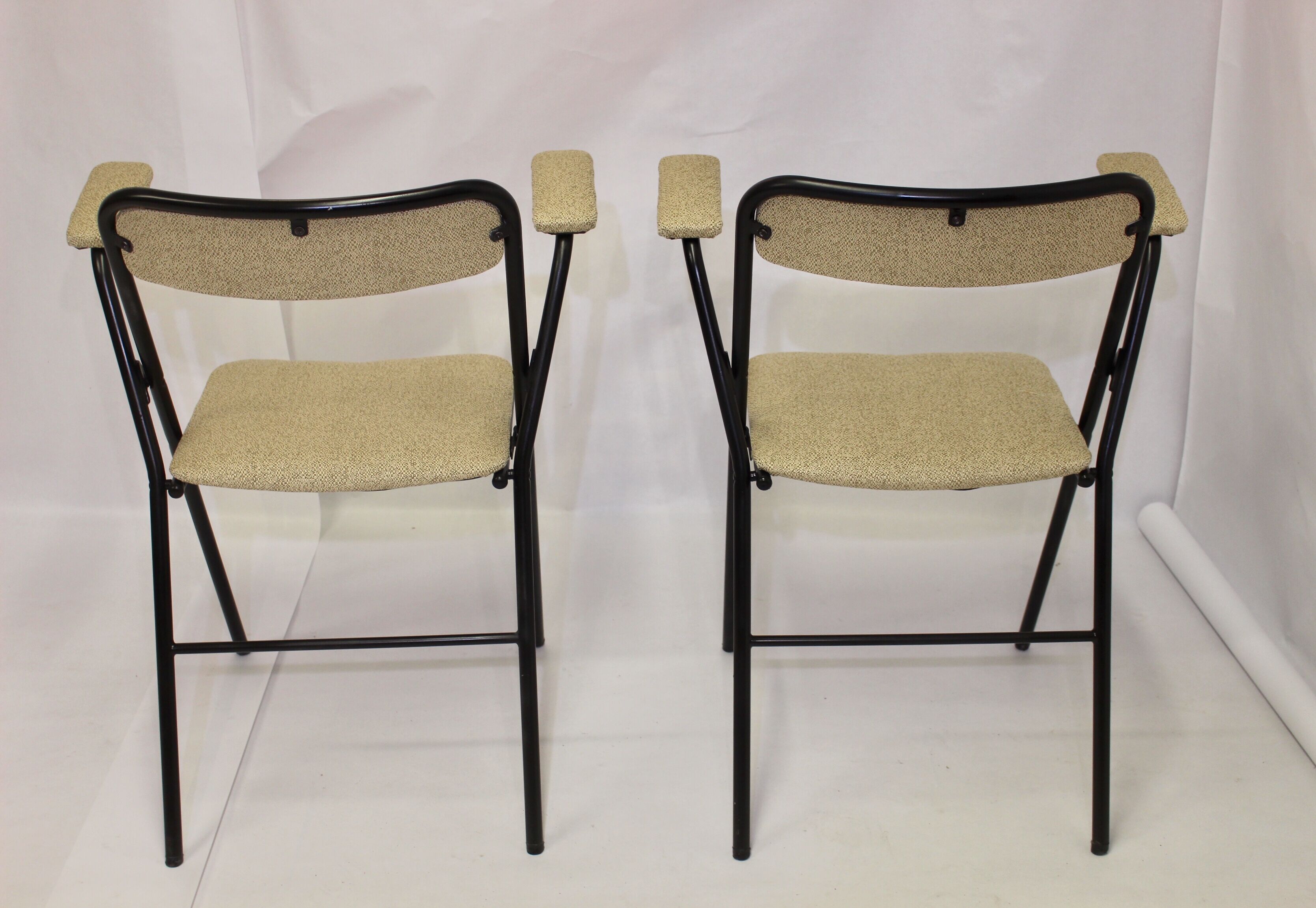 Pair of folding chairs with vintage armrests, 70s