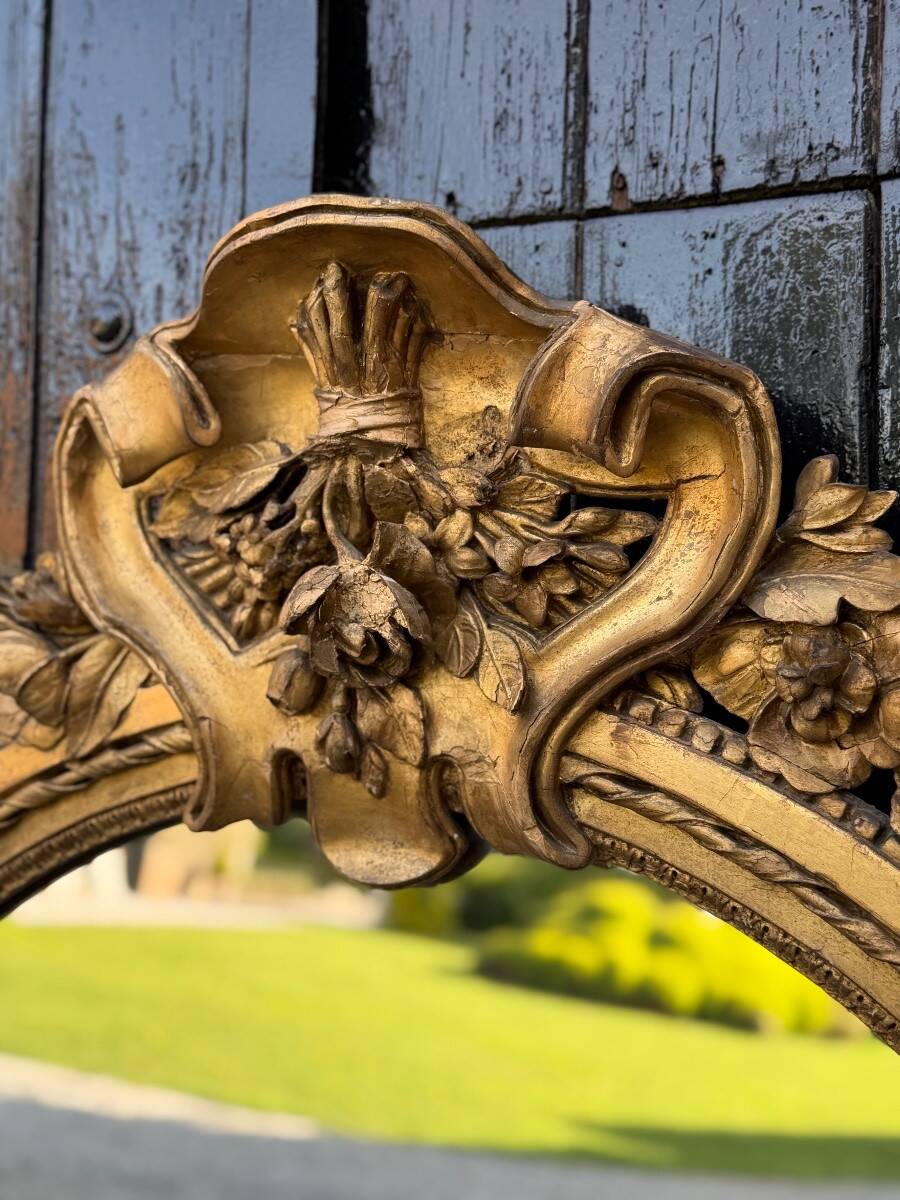 Louis XVI mirror in carved and gilded wood, 18th century