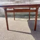 Rectangular extendable table in Scandinavian style made of teak.