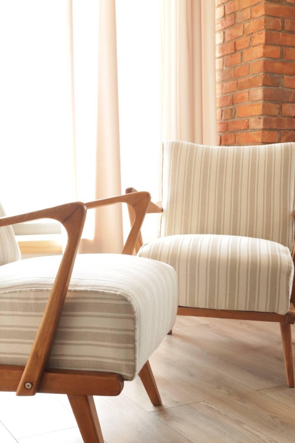 Scandinavian armchair in beige and white striped fabric