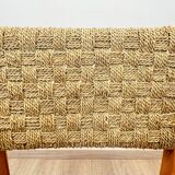 Pair of woven teak armchairs