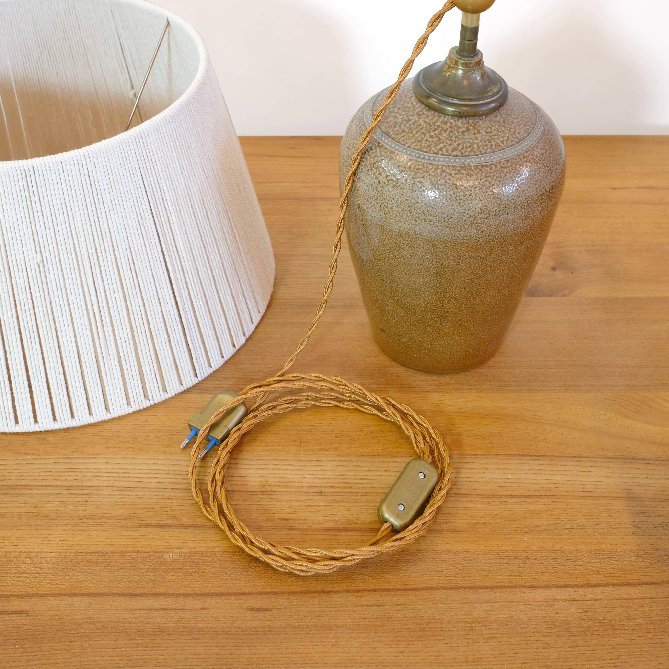 Stoneware lamp with a cotton thread shade, 1970s.