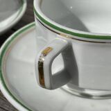 Pair of vintage Apilco style bistro cups in white and green ceramic
