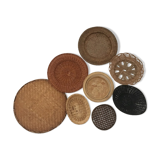 Wall composition of 8 baskets and wicker trays.