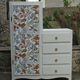 Asymmetrical cabinet