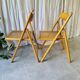 Pair of folding cane chairs