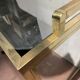 1970s brass bar with a mirrored front from the 20th century.