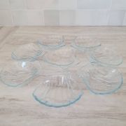 8 small shell-shaped ramekins in transparent glass