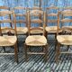 8 antique Vendée straw chairs in solid cherry wood.