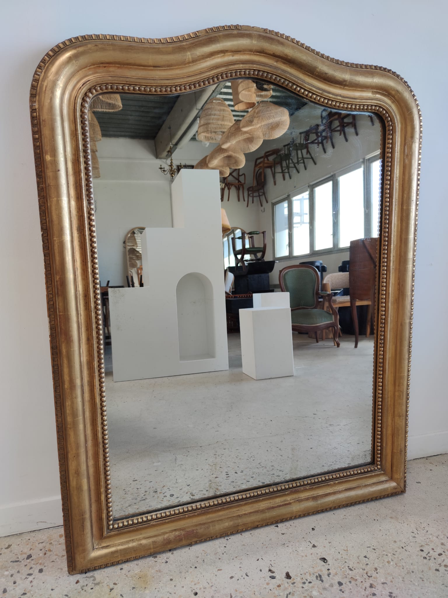 Louis Philippe gilded mirror with gendarme hat nineteenth H:130cm