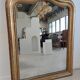 Louis Philippe gilded mirror with gendarme hat nineteenth H:130cm
