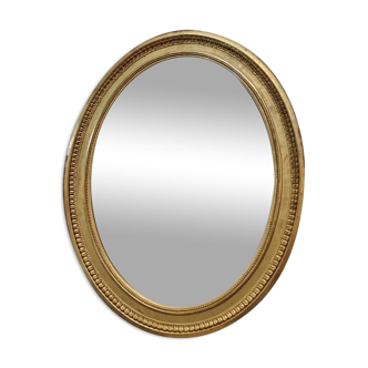 Miroir ovale louis philippe à la feuille d'or