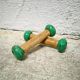 Pair of vintage cast iron and wood dumbbells
