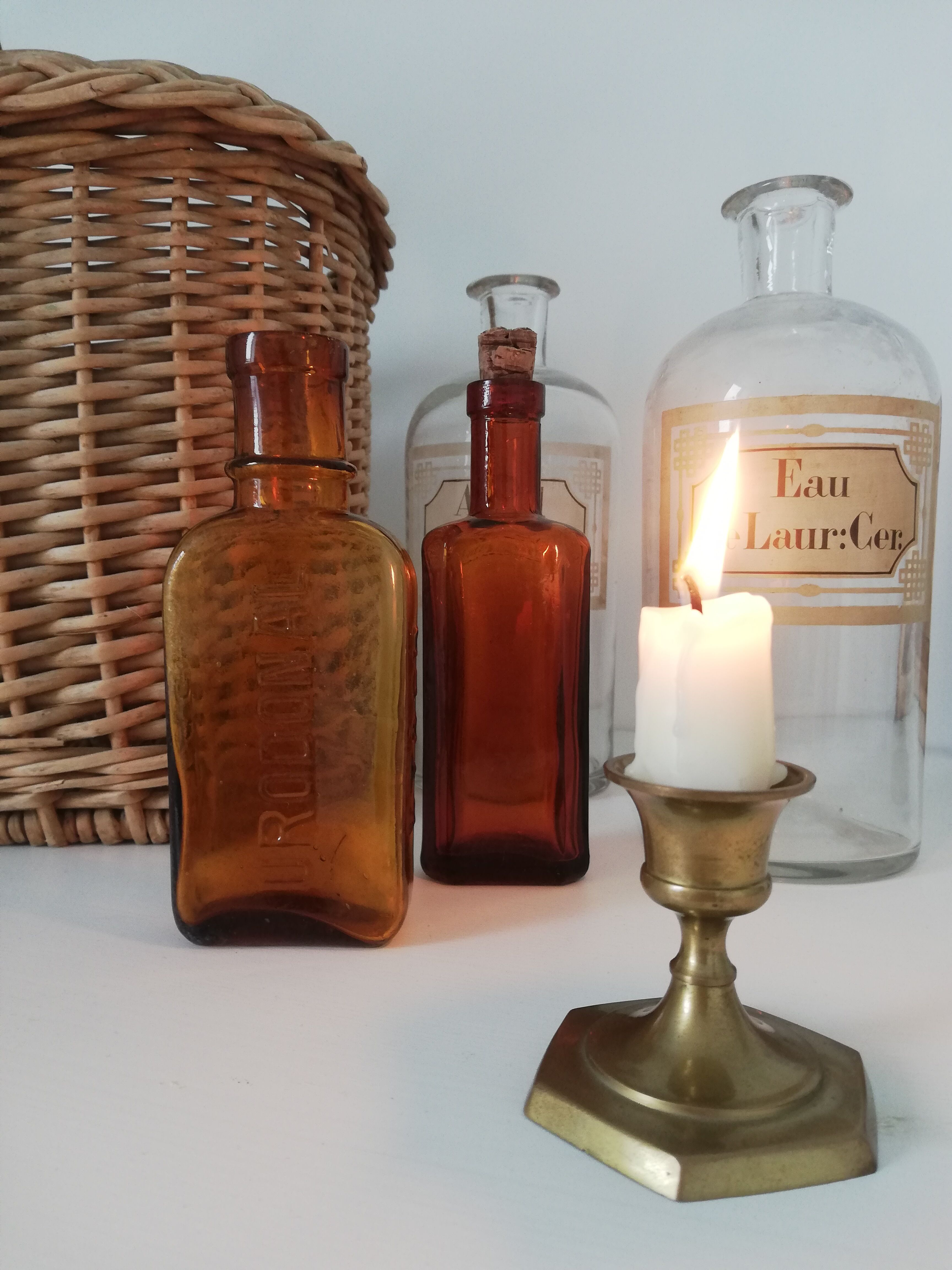 2 amber apothecary bottles