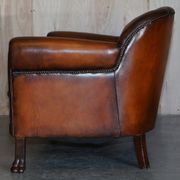 Victorian Chesterfield leather canapé with oak lion claw feet.