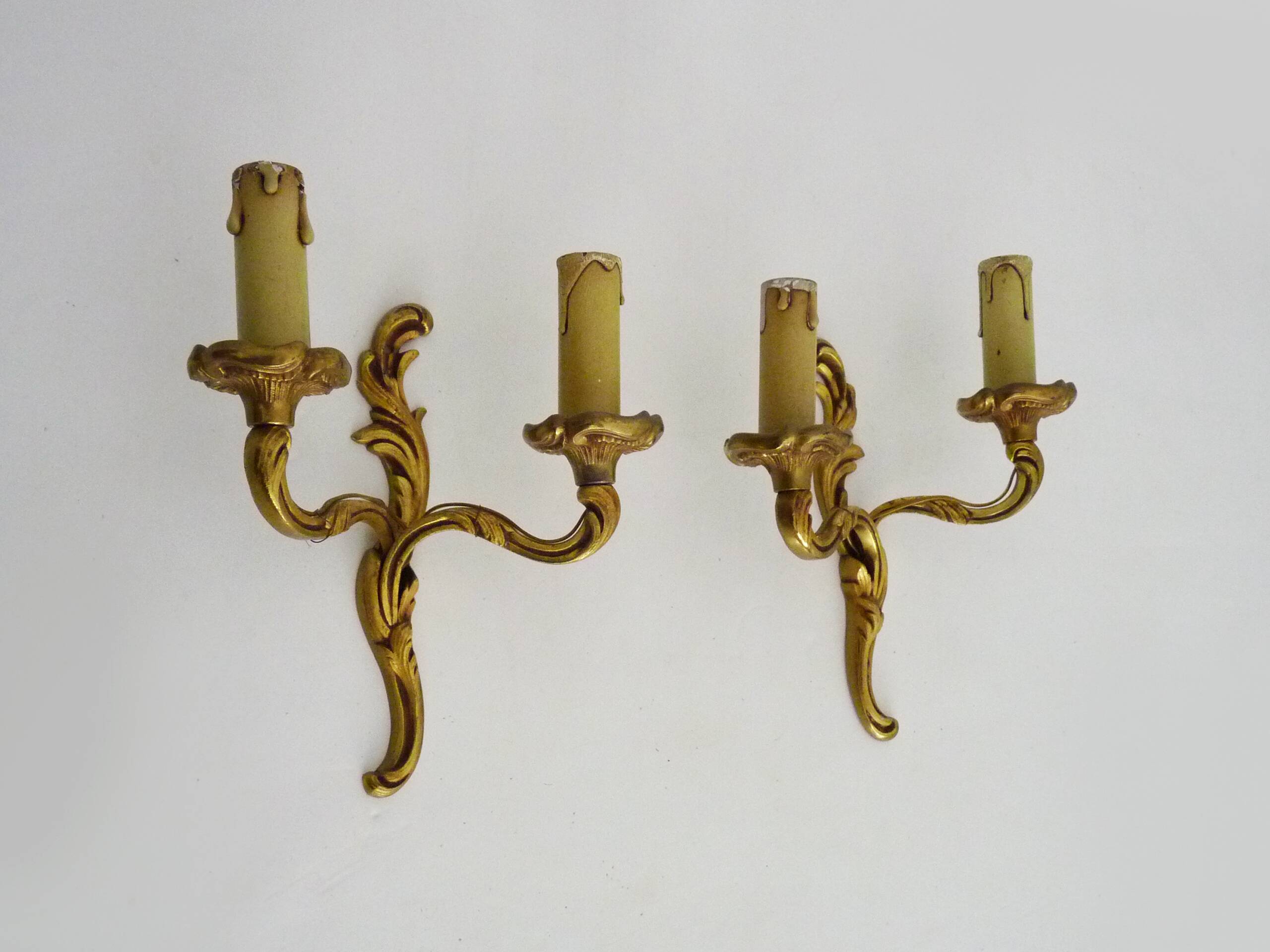 Old pair of double wall sconces in bronze.