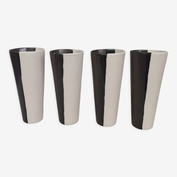 4 black and white ceramic cups