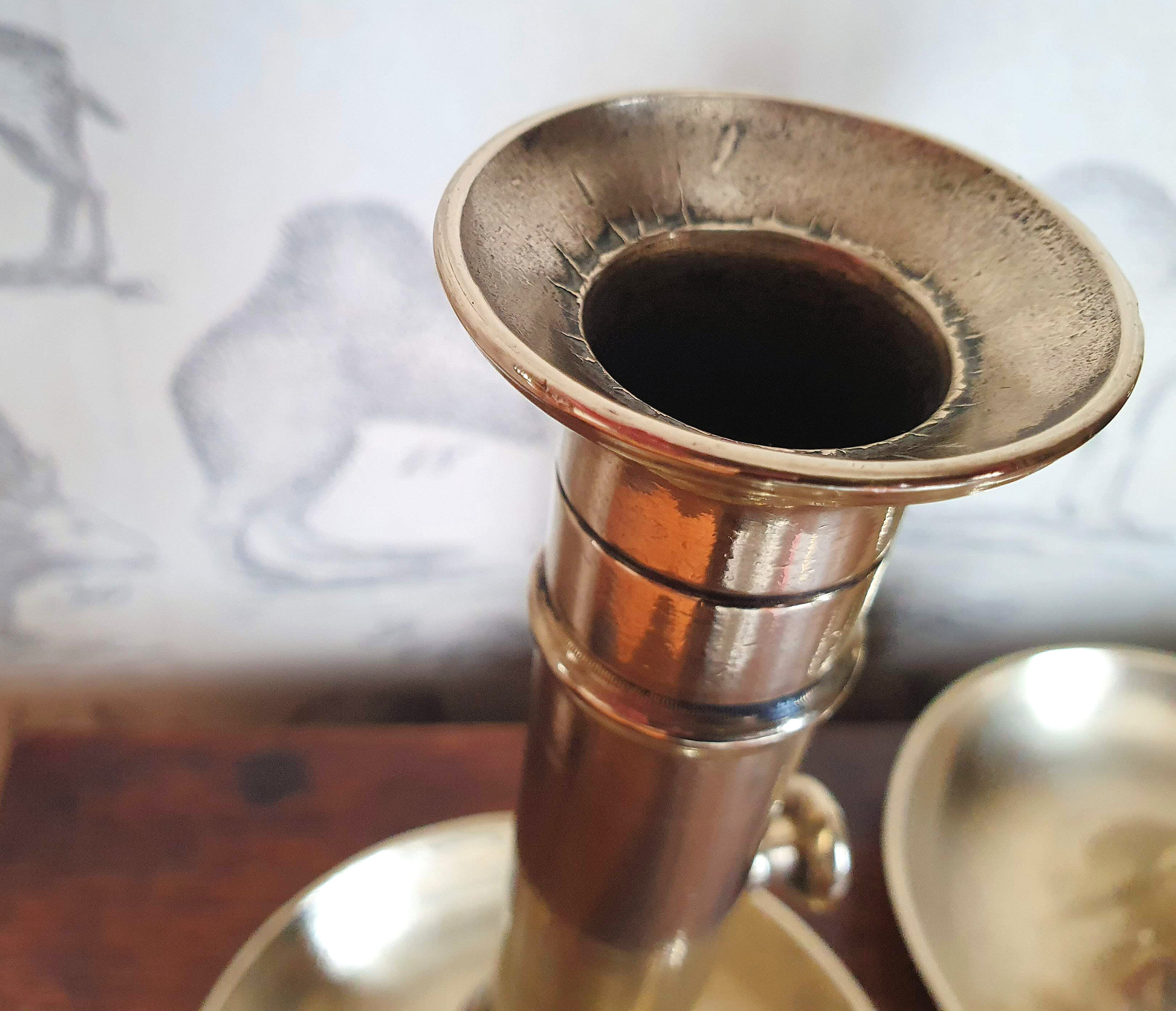 Duo of old brass candle holders