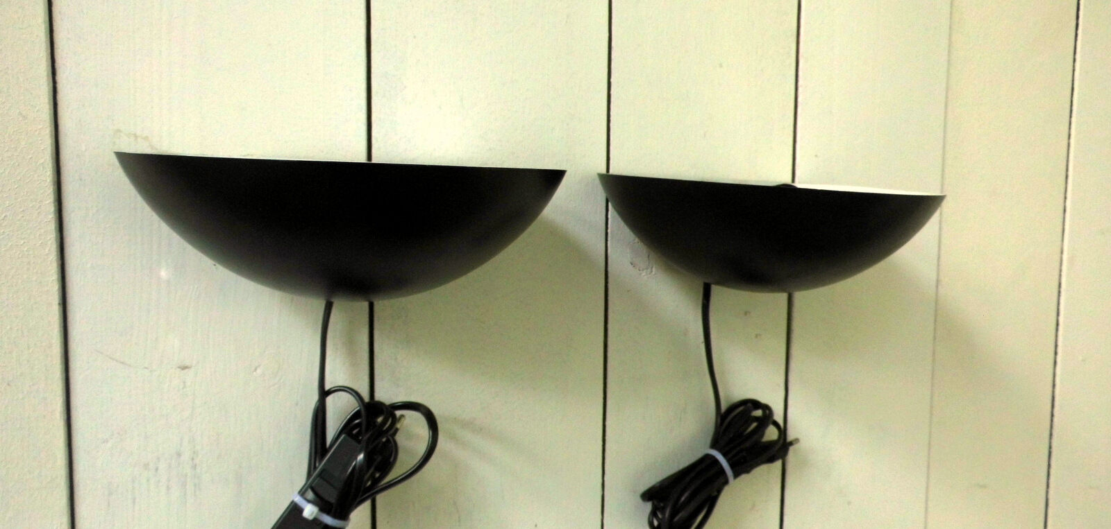 Pair wall sconces in black metal
