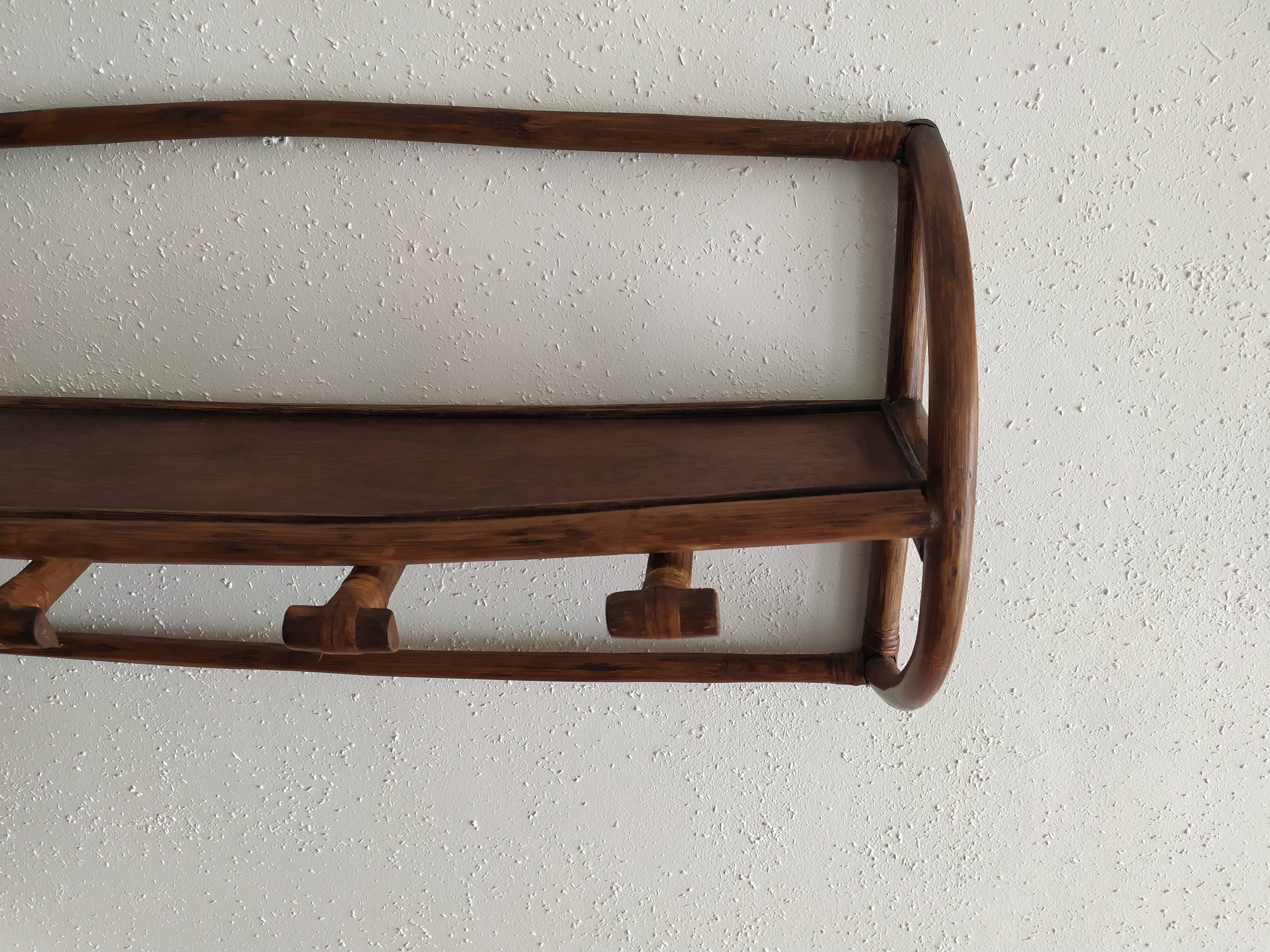 Rattan wall coat holder
