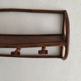 Rattan wall coat holder