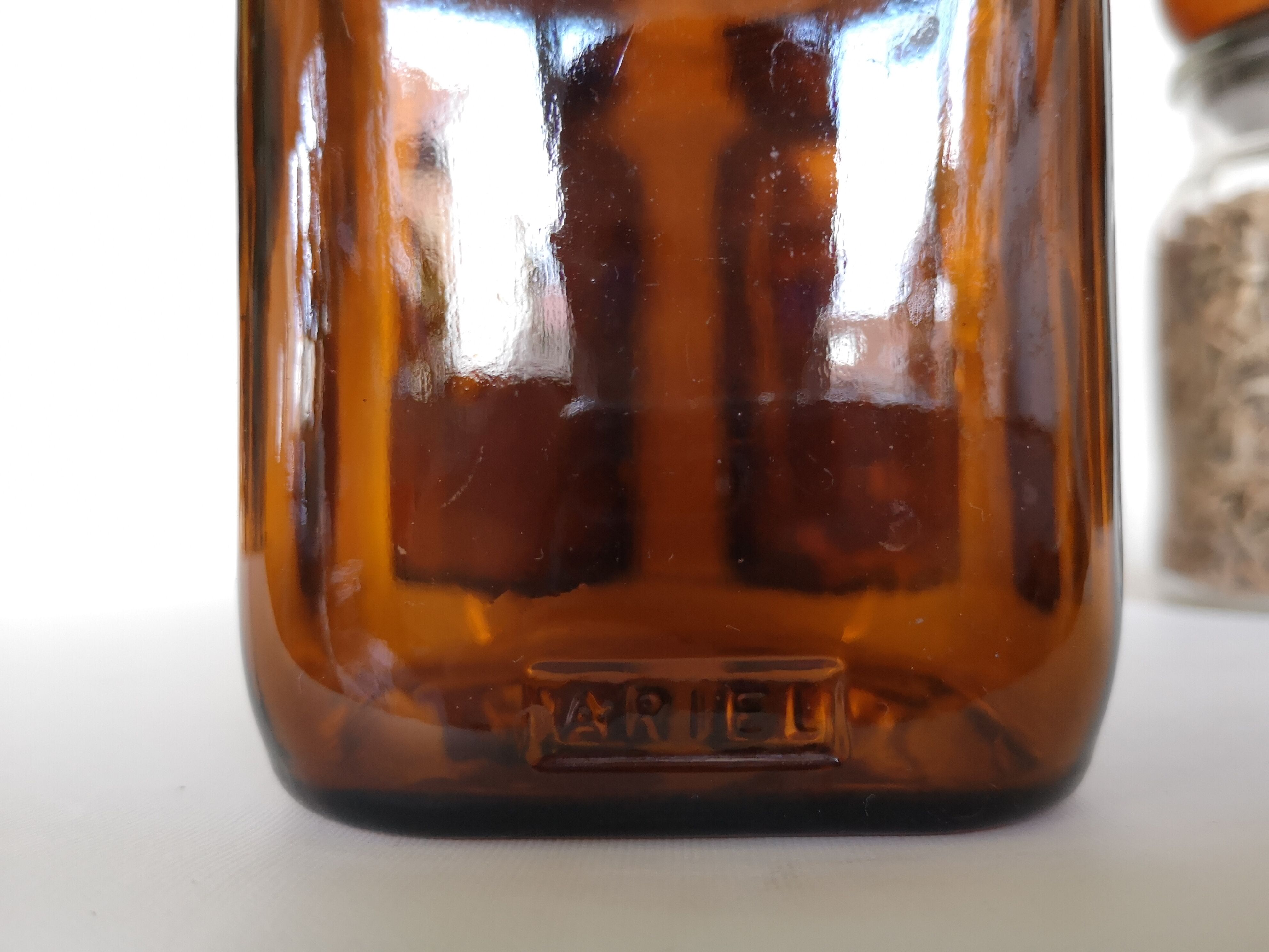 Set of 4 clear and brown glass jars