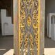 Rectangular Indonesian construction element with blue and yellow plant in carved wood