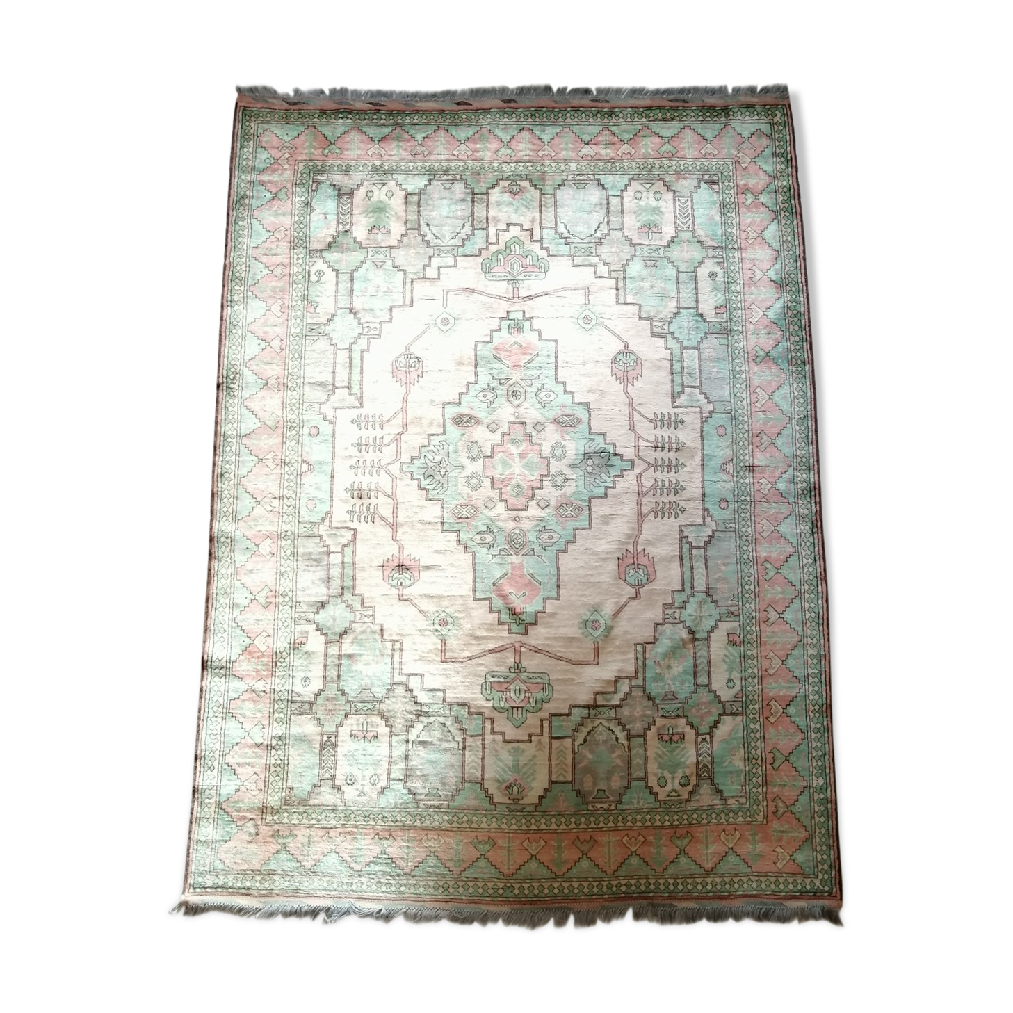Afghan rug in pastel colors