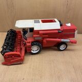 Red combine harvester