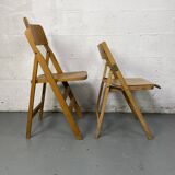 Pair of mismatched wooden folding chairs