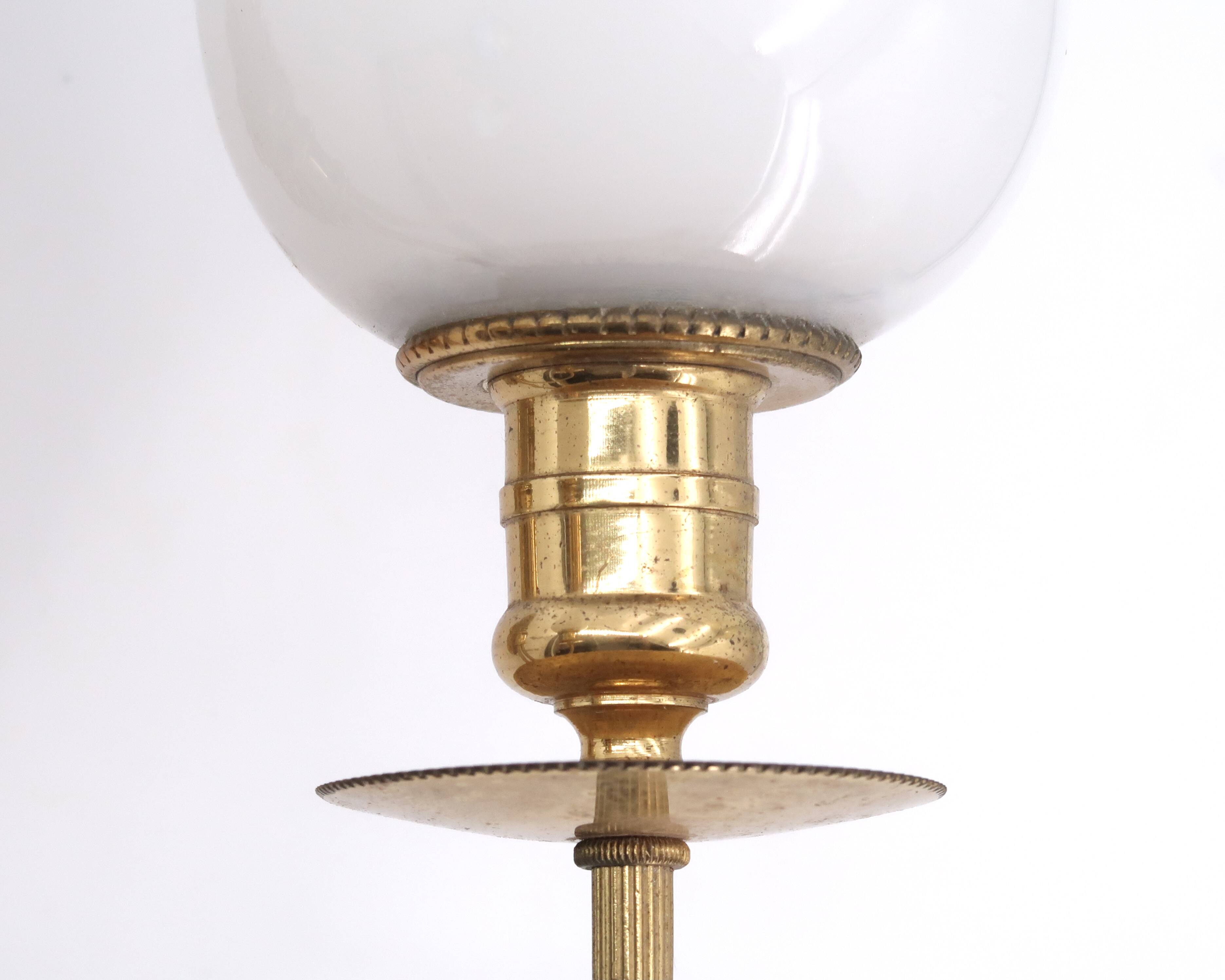 Three wall lights in brass and opaque glass, 1950s