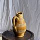 Vintage yellow stoneware carafe with beaded friezes Made in France H22
