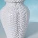 Vintage table lamp in woven ceramic Regency style.