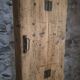 Antique French workshop cabinet in pine with compartments.