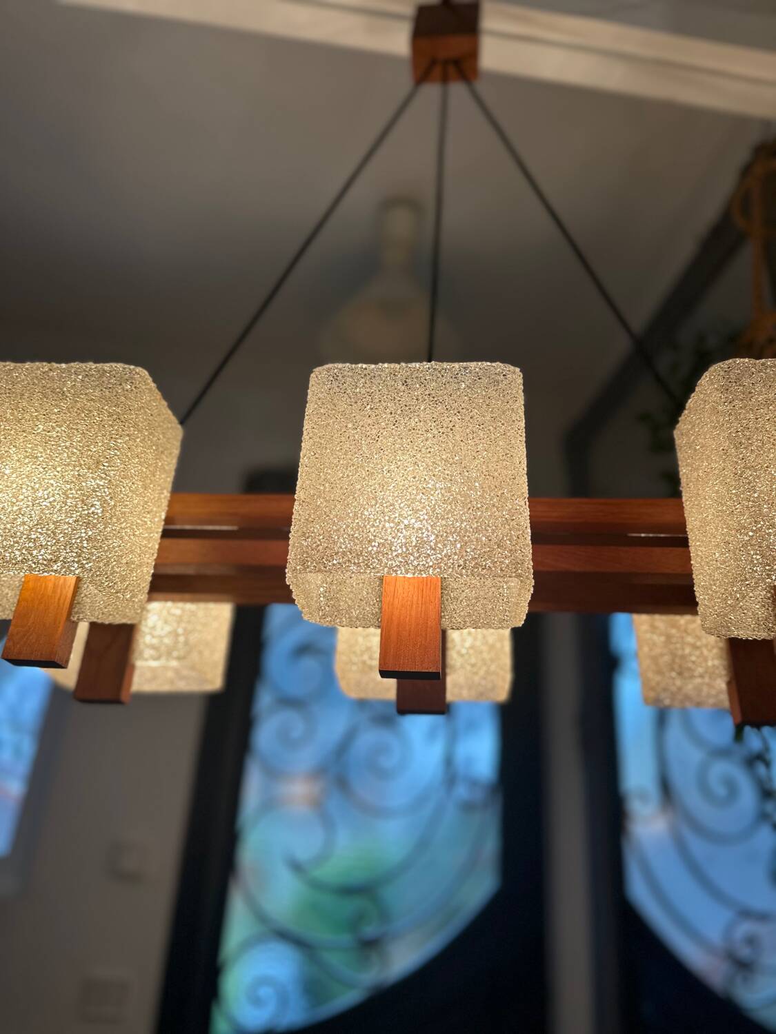Vintage 1950s Scandinavian teak and perspex pendant light.