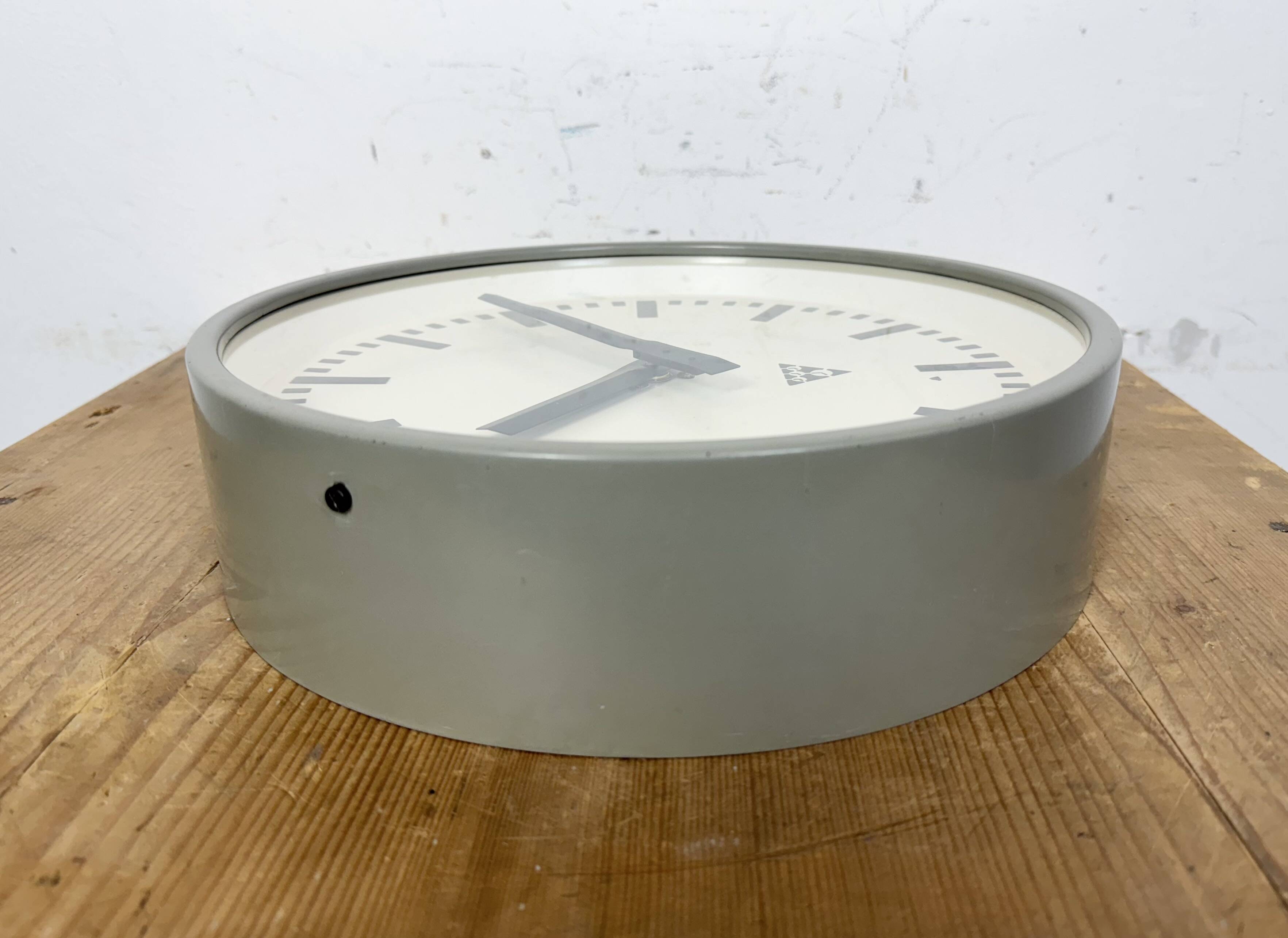 Industrial grey factory wall clock from pragotron, 1960s