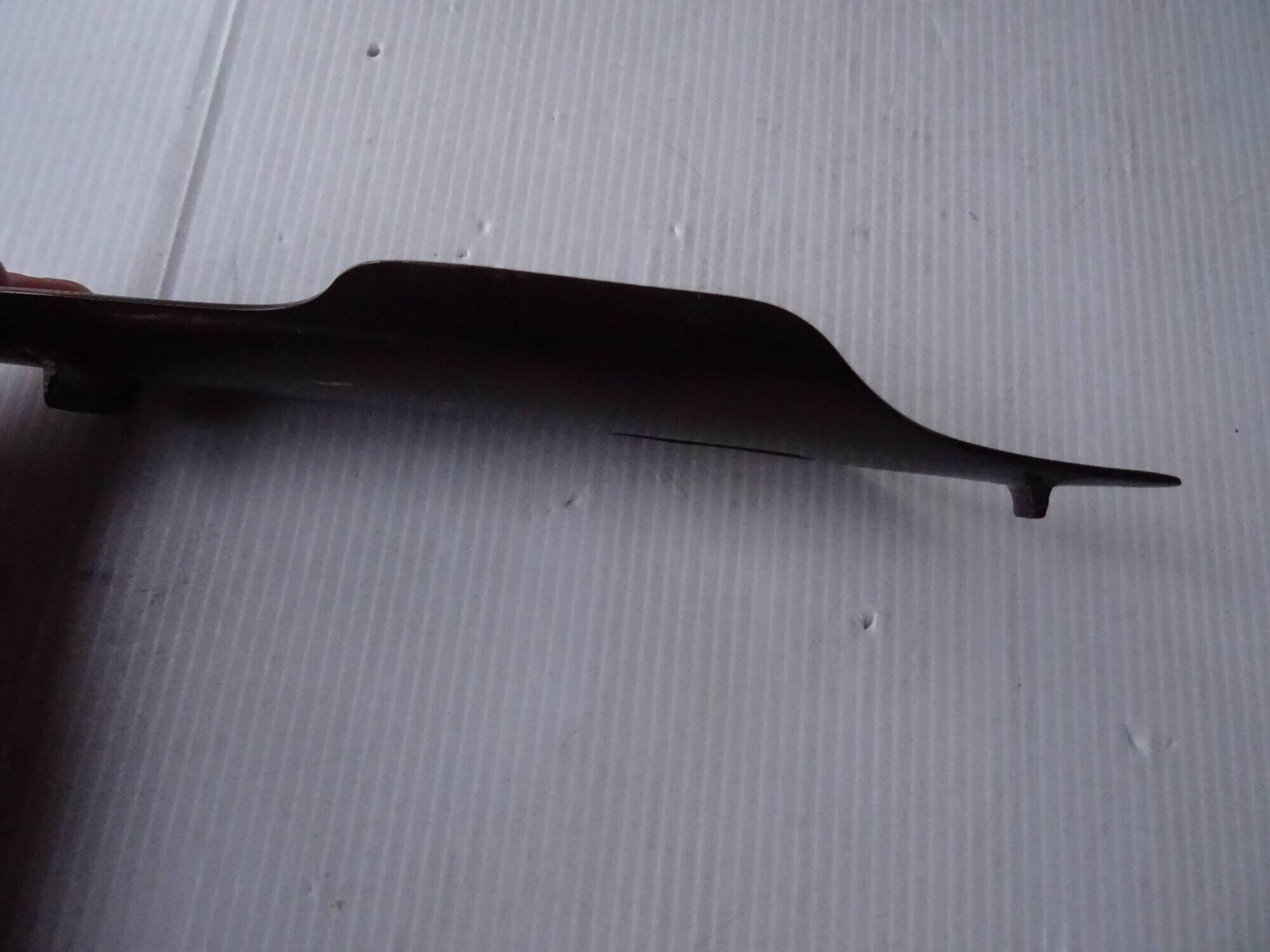 Empty feather holder bronze office pocket representing a pen feather