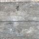 Side table in painted wood aged and patinated by time
