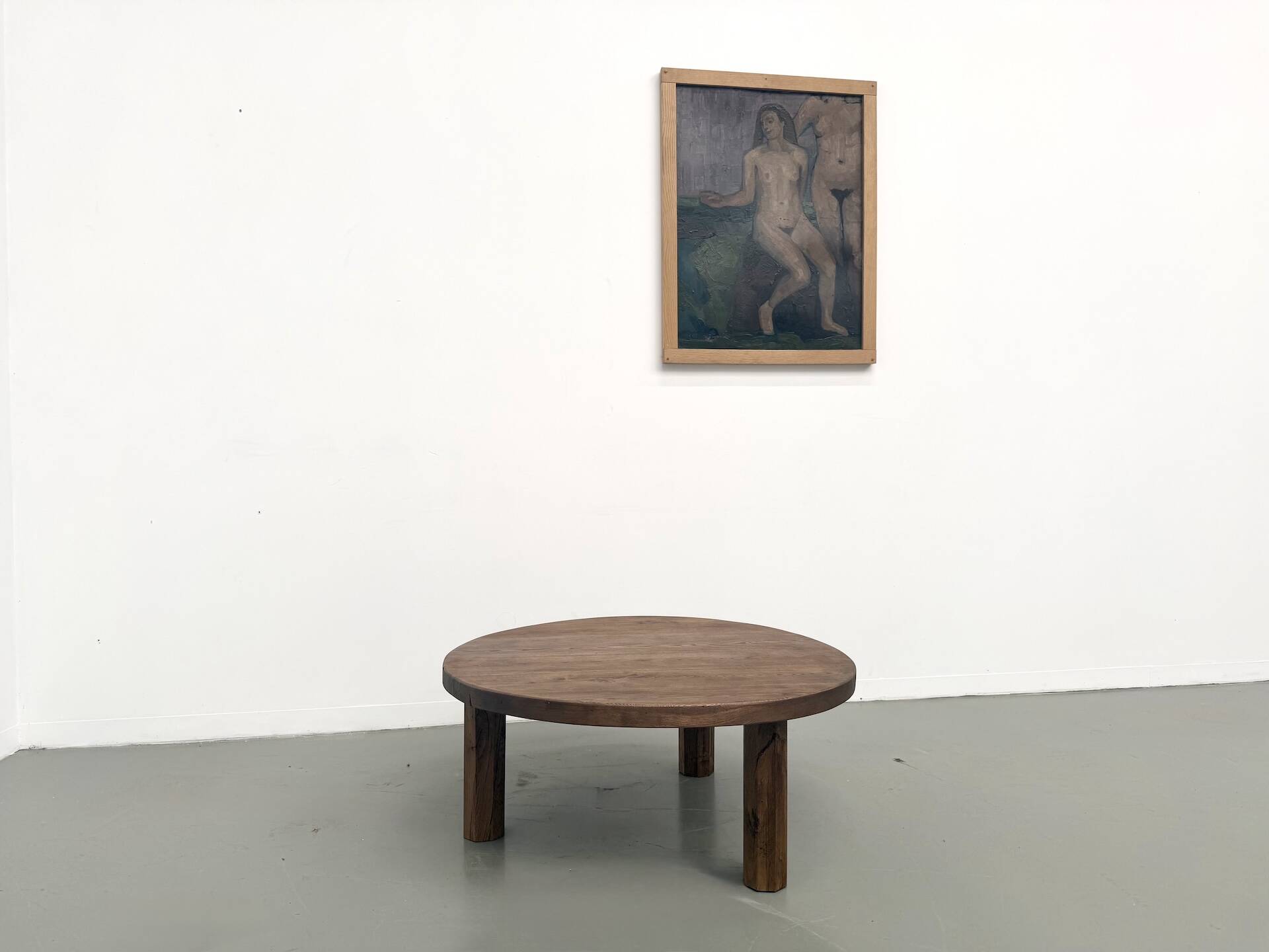 Round coffee table in solid oak, octagonal legs, France, 1950s.