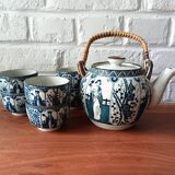 Asian ceramic and rattan tea set with plant geisha motifs
