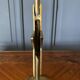 Pair of brass candlesticks decorated with 20th century stars