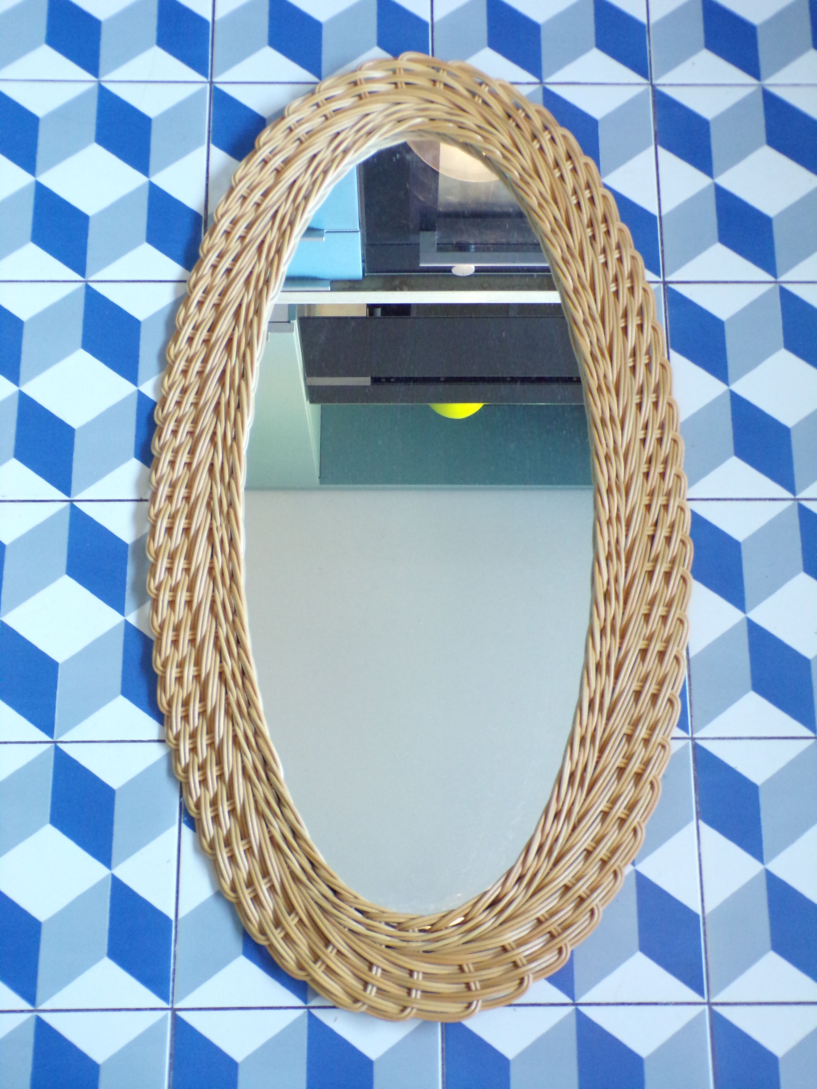Oval rattan mirror