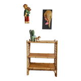 Blond rattan shelf