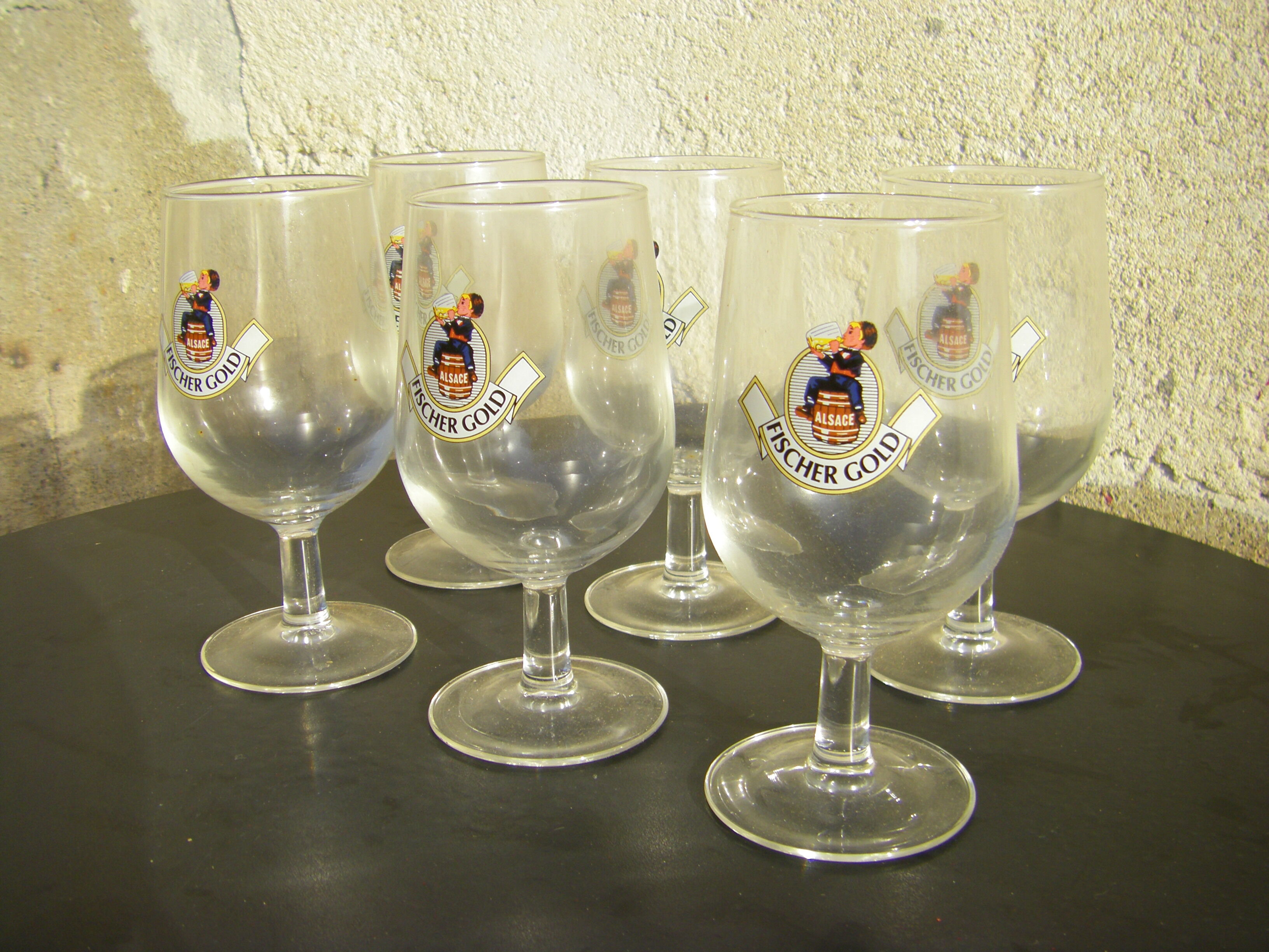 Six Fischer Gold beer glasses