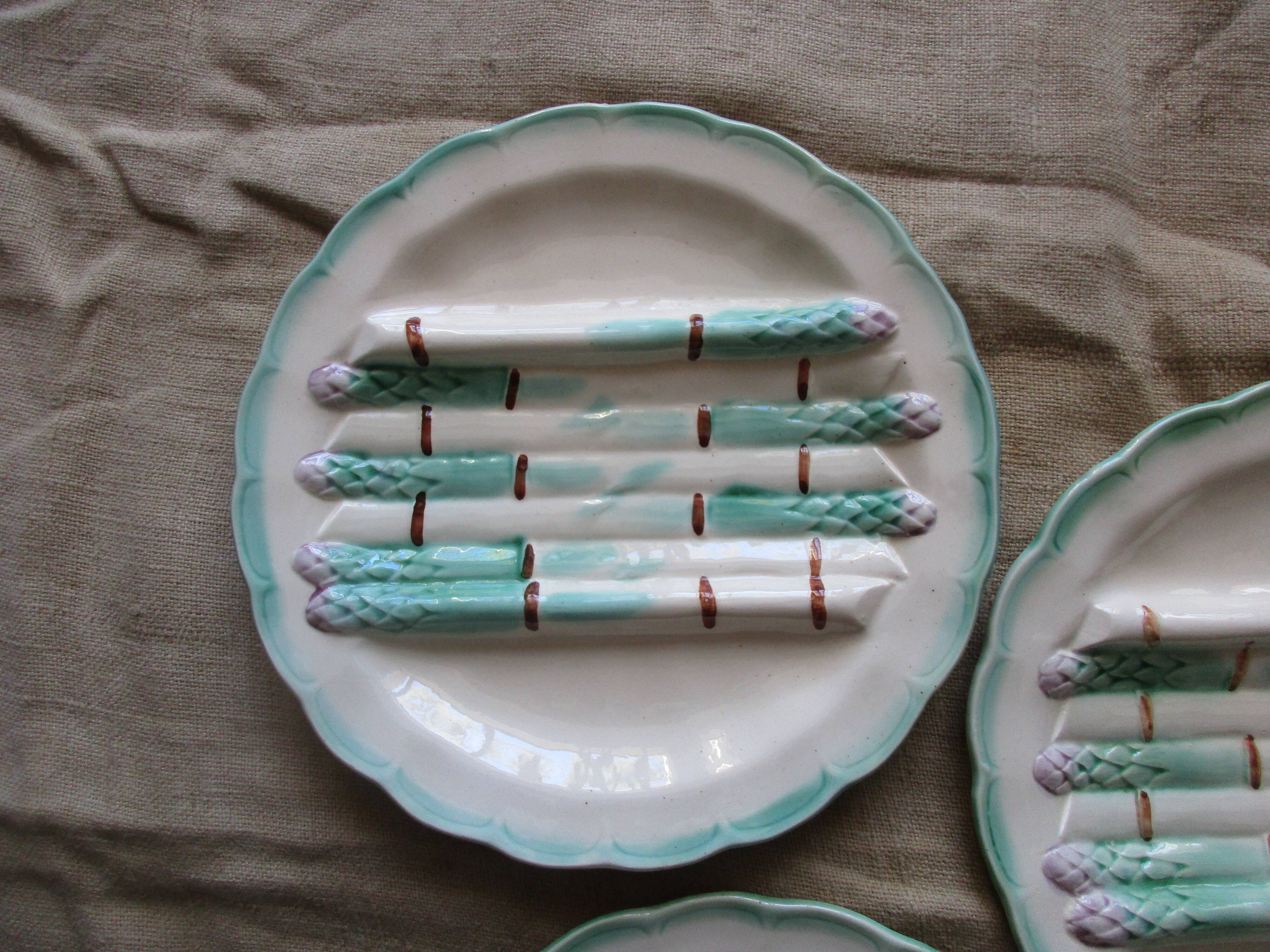 3 plates dishes a asperges in barbotine brand longchamp terre of fer