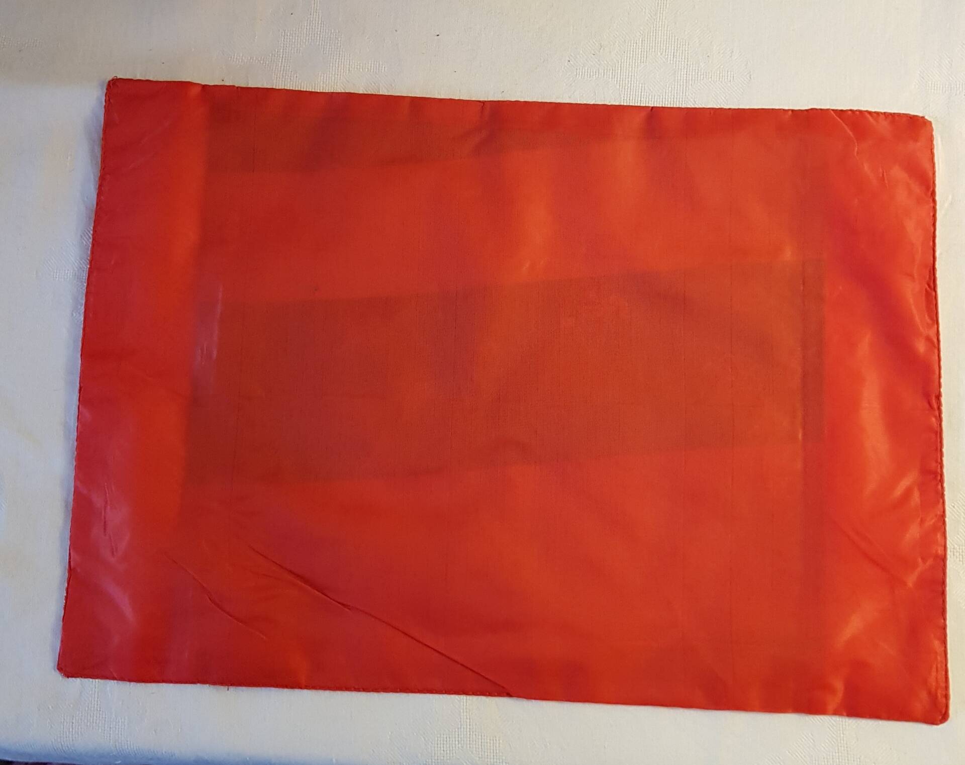 Set of 6 small table napkins in red brocade.