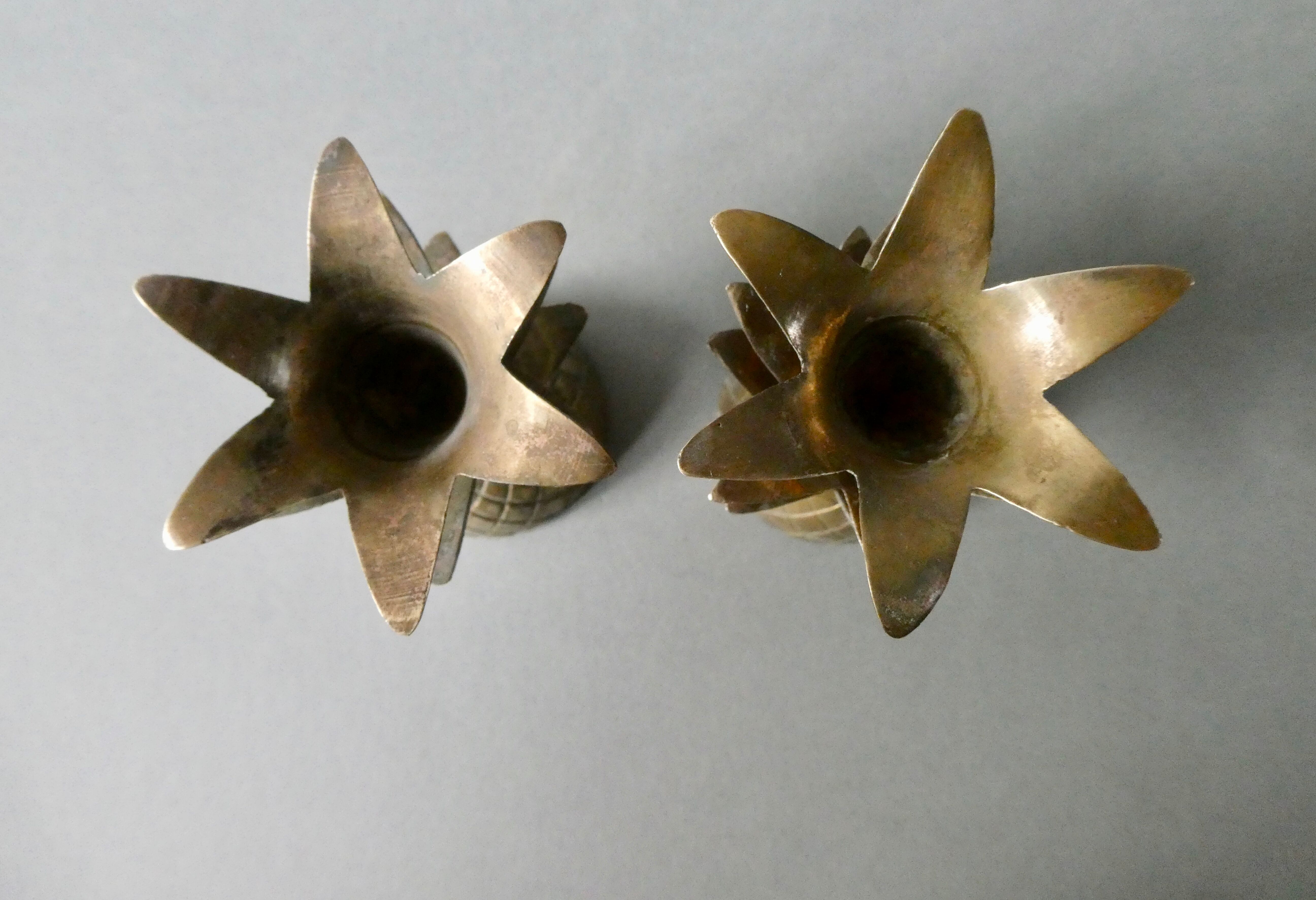 Pair of pineapple candlesticks, brass