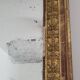 Golden stucco and wood Empire mirror